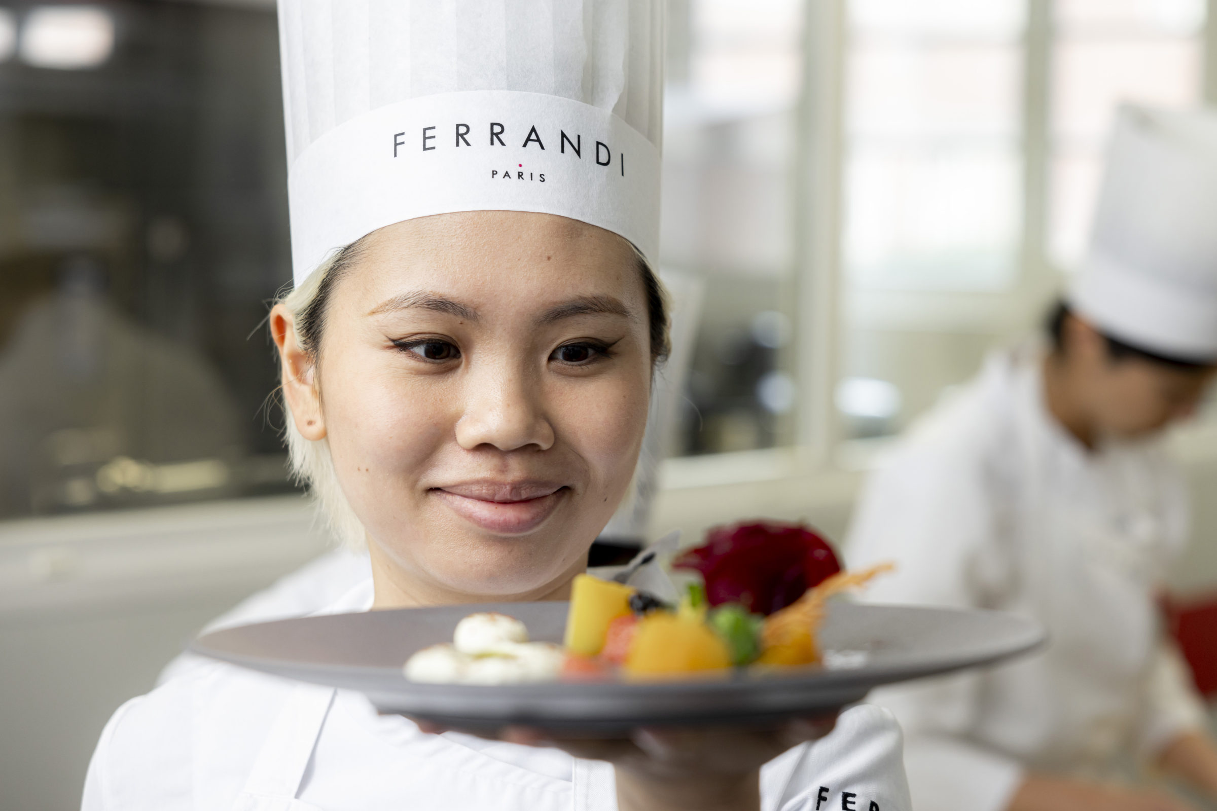 A chef plating a dish